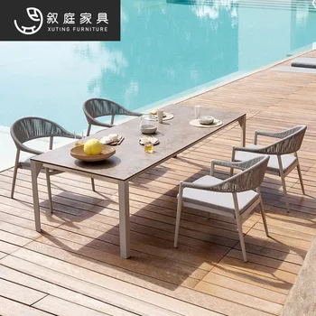 Açık masa ve sandalye kombinasyonu eğlence avlu bahçe teras rattan villa yüksek dereceli yemek masası ve sandalye mobilya